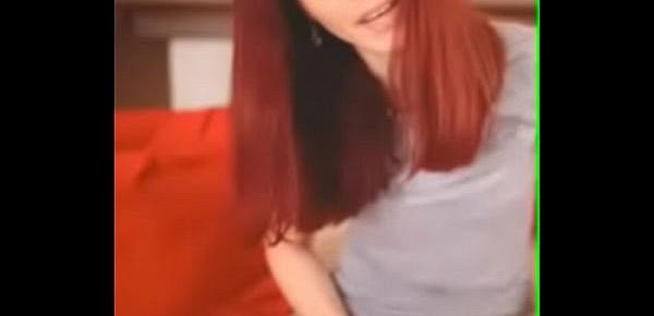  Redhead babe shows pussy